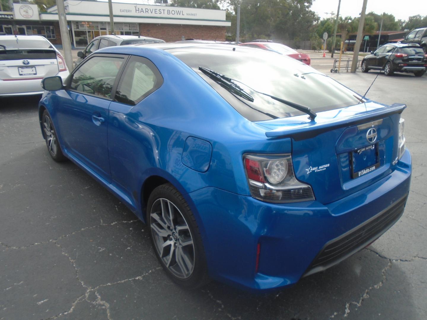 2014 Scion tC Sports Coupe 6-Spd AT (JTKJF5C75E3) with an 2.4L L4 DOHC 16V engine, 6-Speed Automatic transmission, located at 6112 N Florida Avenue, Tampa, FL, 33604, (888) 521-5131, 27.954929, -82.459534 - Photo#4